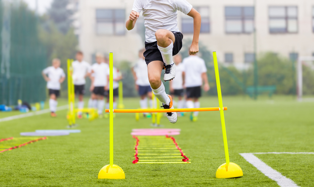 Soccer Player on Fitness Training Footballers on Practice Session